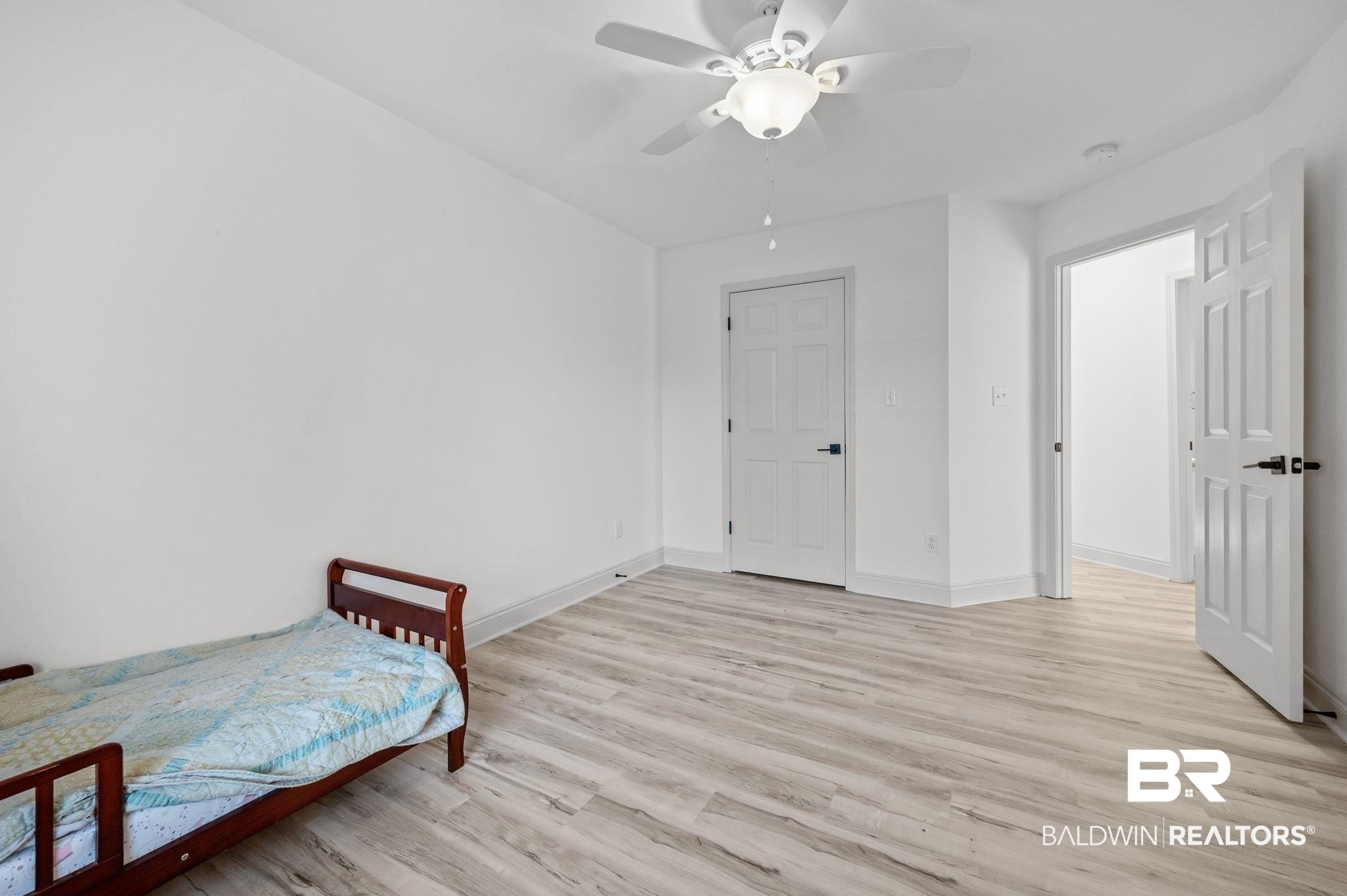 136 Destrehan Road Fairhope, AL 36532 - Photo 24 of 44 Bedroom with ceiling fan and light hardwood / wood-style floors