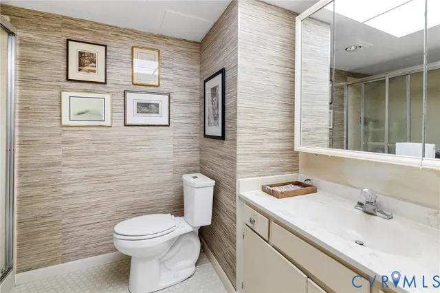 a bathroom with a sink and a toilet