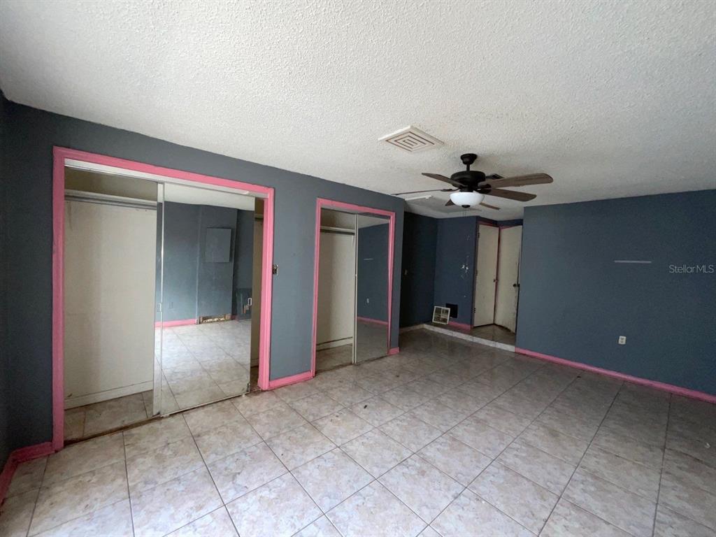 15839 Hicks Road Hudson, FL 34667 - Photo 11 of 16 a view of gallery with wooden floor