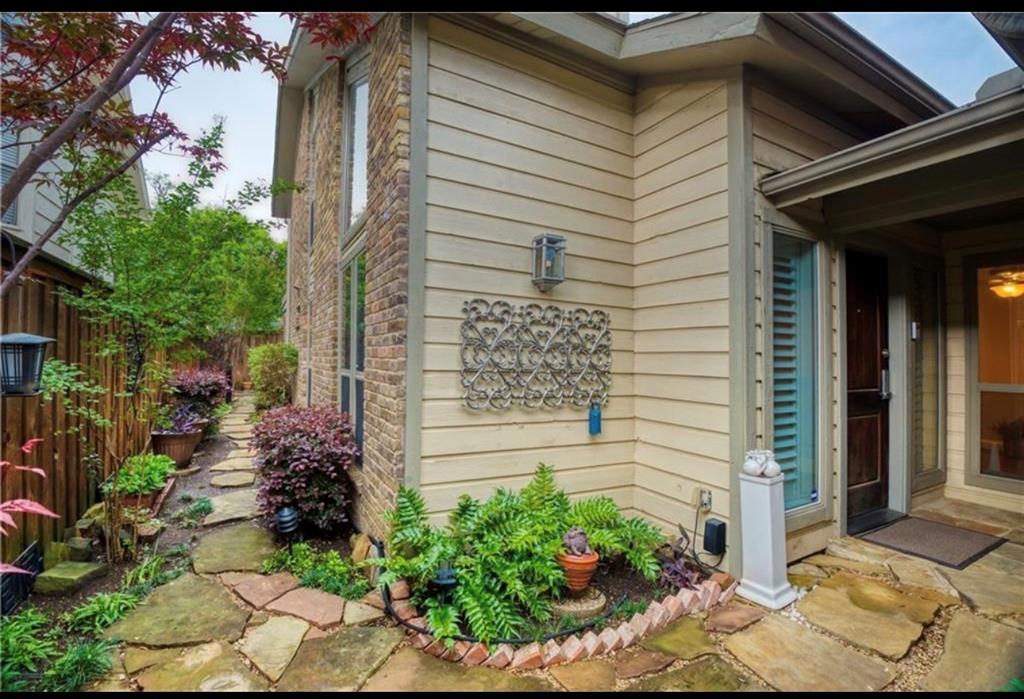 4970 Thunder Road Dallas, TX 75244 - Photo 7 of 19 Beautifully designed by Mark Schecter this two story duplex lives like a townhome.