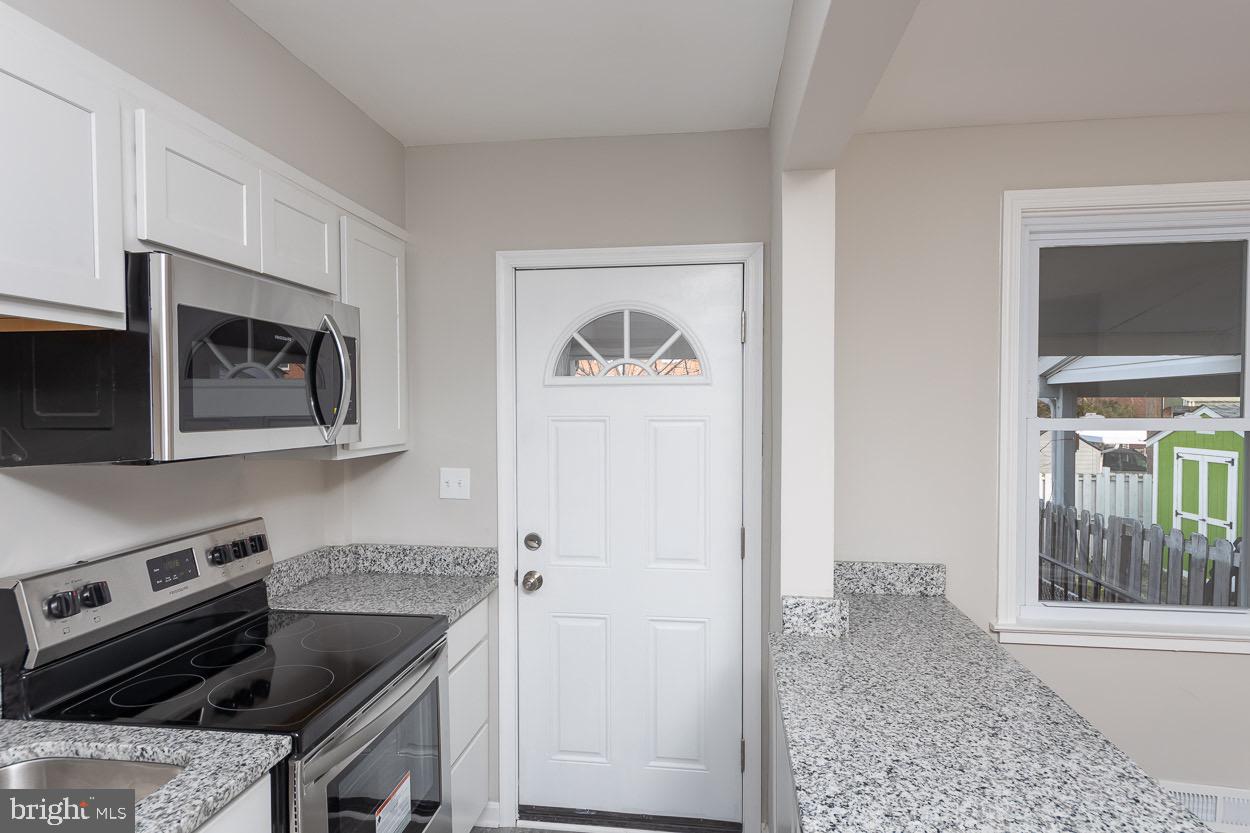 6938 Broening Road Dundalk, MD 21222 - Photo 22 of 37 Another View of Galley Kitchen