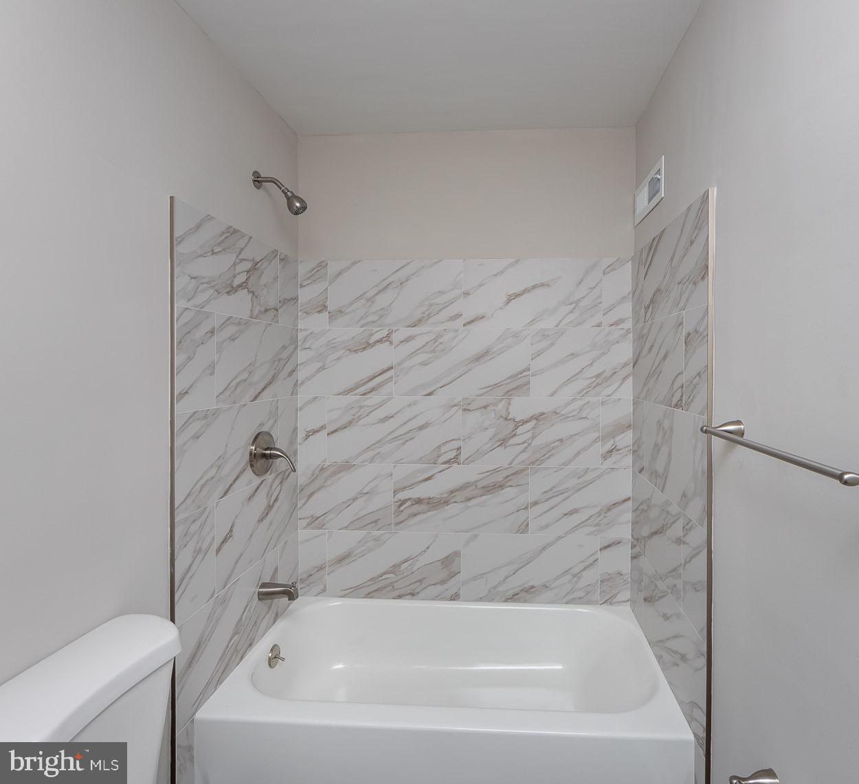 6938 Broening Road Dundalk, MD 21222 - Photo 30 of 37 Custom Tile in Upper Level Bath