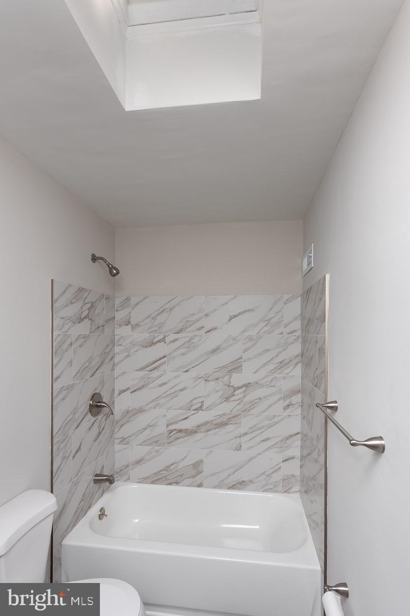 6938 Broening Road Dundalk, MD 21222 - Photo 31 of 37 Natural Light with Skylight in Upper Bath