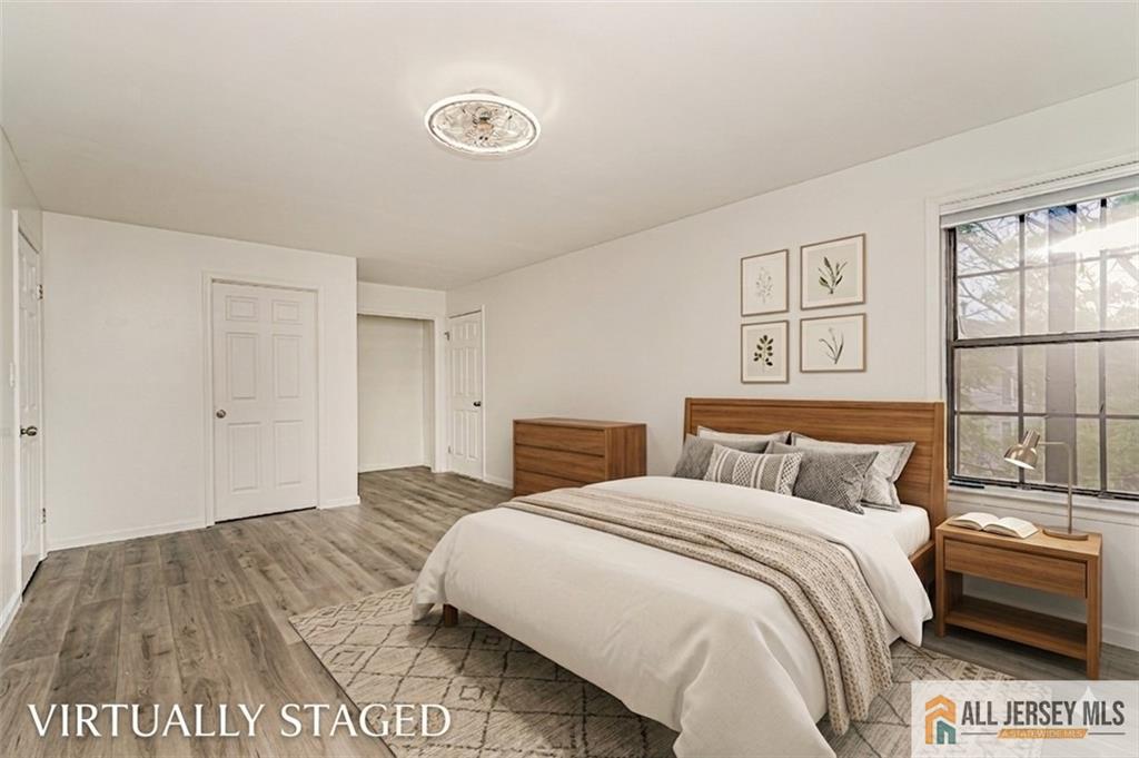 612 Chester Court Helmetta, NJ 08828 - Photo 15 of 31 a bedroom with a bed and a window