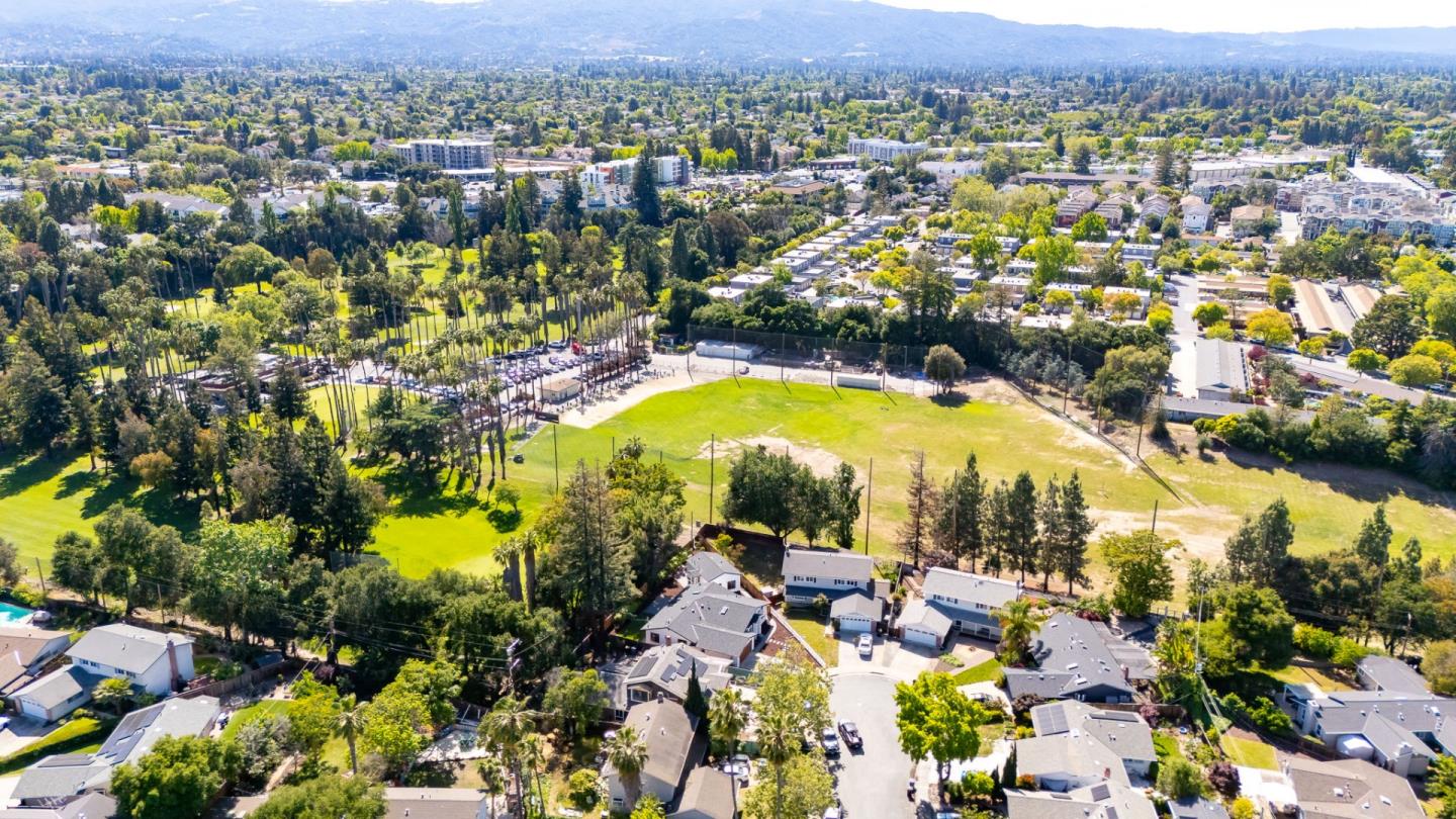 1003 Rosa Avenue Sunnyvale, CA 94086 - Photo 65 of 68 an aerial view of residential houses with outdoor space and swimming pool