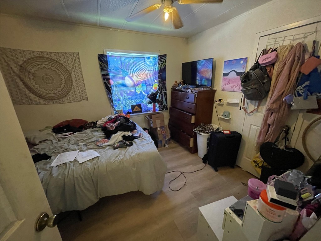 3104 Ricks Road Killeen, TX 76549 - Photo 11 of 15 a bedroom with a bed and a walk in closet