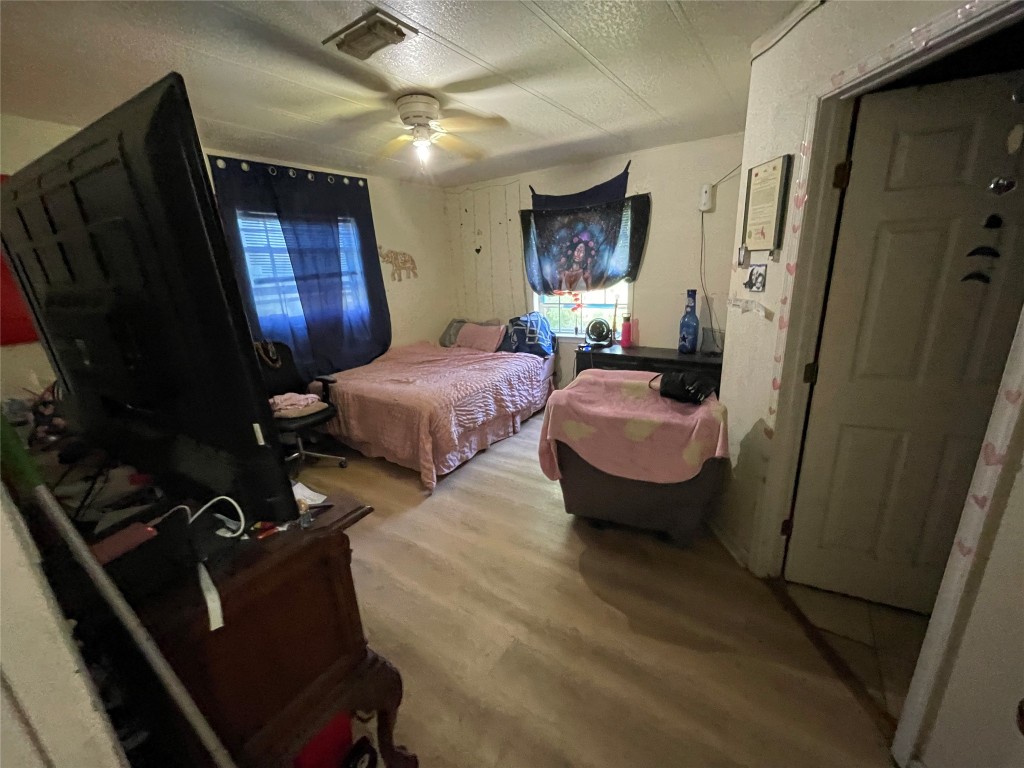 3104 Ricks Road Killeen, TX 76549 - Photo 14 of 15 a bedroom with bed mirror and window