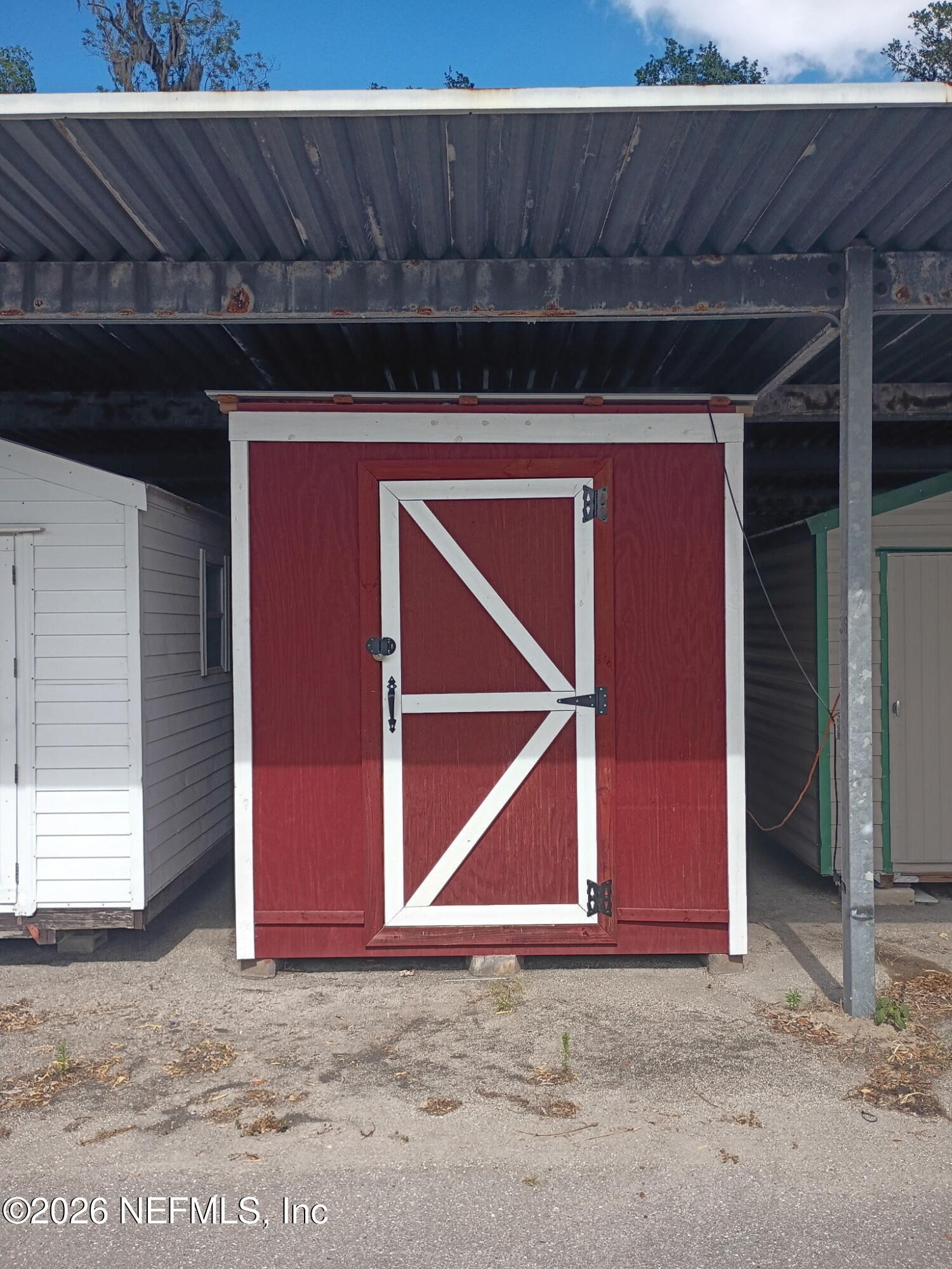 1259 The Grove Road Orange Park, FL 32073 - Photo 27 of 28 84 sqft storage shed