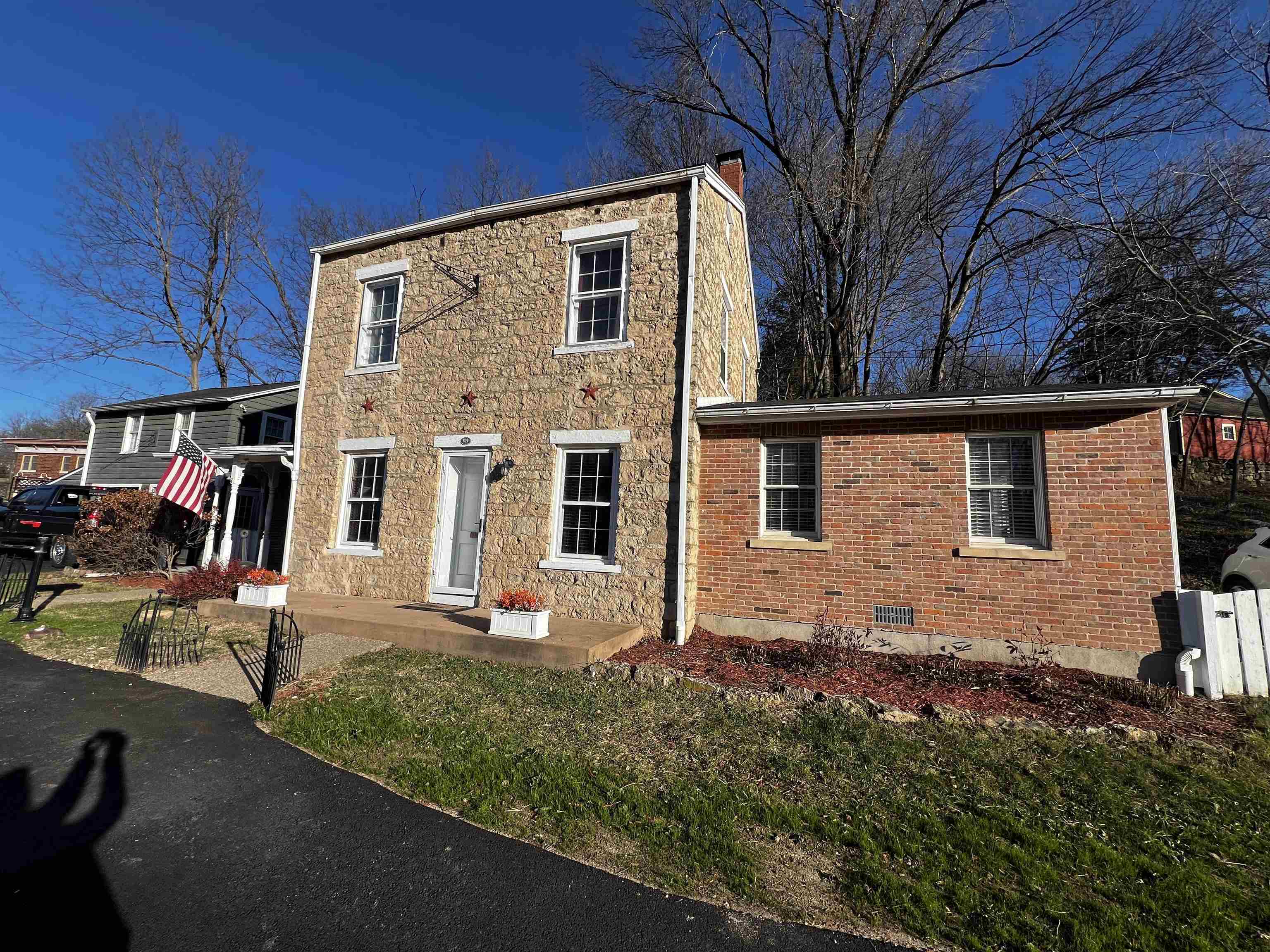 809 Spring (hwy 20) Street Galena, IL 61036 - Photo 2 of 18 front view of house with a yard