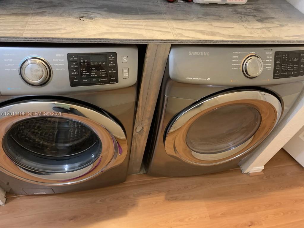 12450 Southwest 125th Terrace, Unit 12450 Miami, FL 33186 - Photo 11 of 23 a close view of washer and dryer