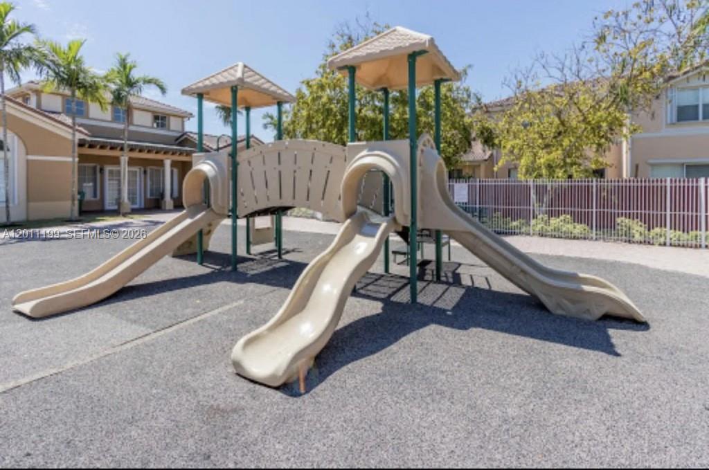 12450 Southwest 125th Terrace, Unit 12450 Miami, FL 33186 - Photo 15 of 23 a view of a slide