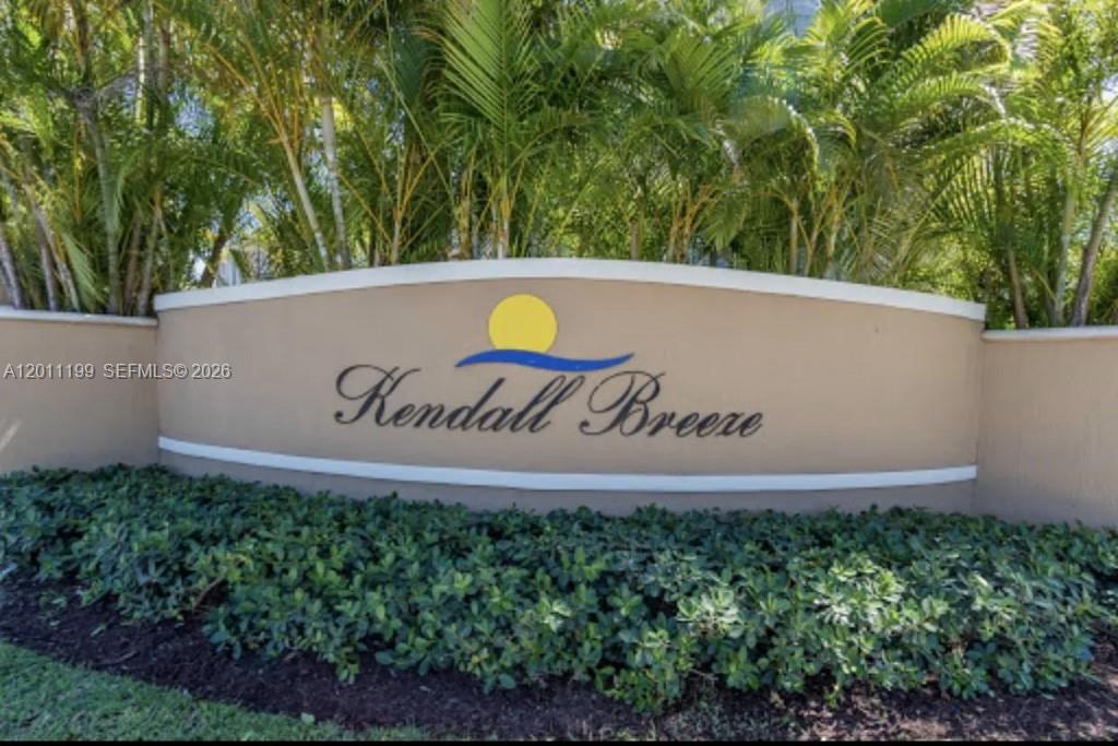 12450 Southwest 125th Terrace, Unit 12450 Miami, FL 33186 - Photo 23 of 23 a sign on the side of a building