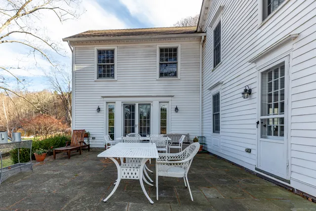 a view of a outdoor seating area with furniture