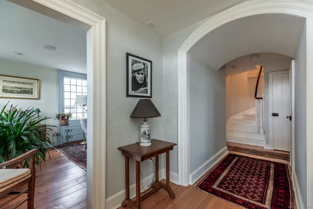 a view of entryway with wooden floor