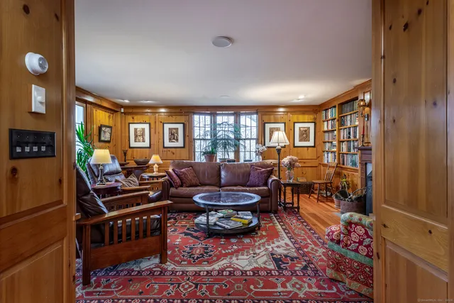 a living room with furniture and a window