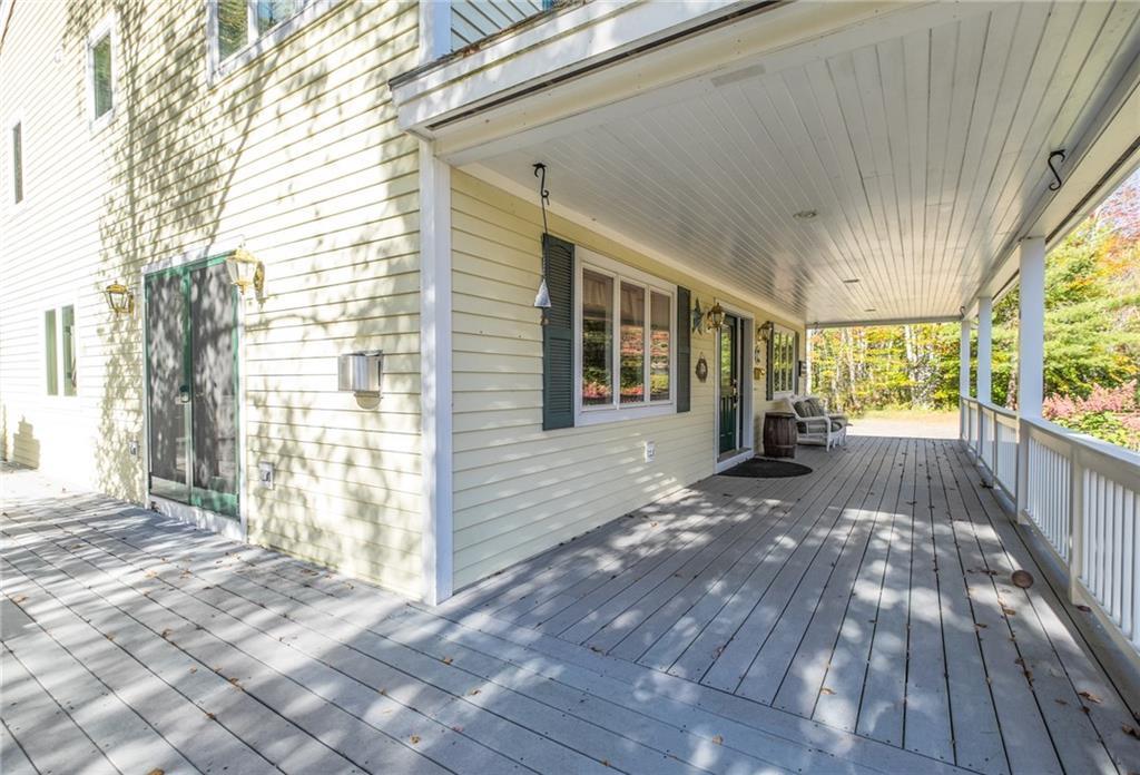 288 Buzzell Hill Road Union, ME 04862 - Photo 9 of 35 10'x36' covered porch on the south...