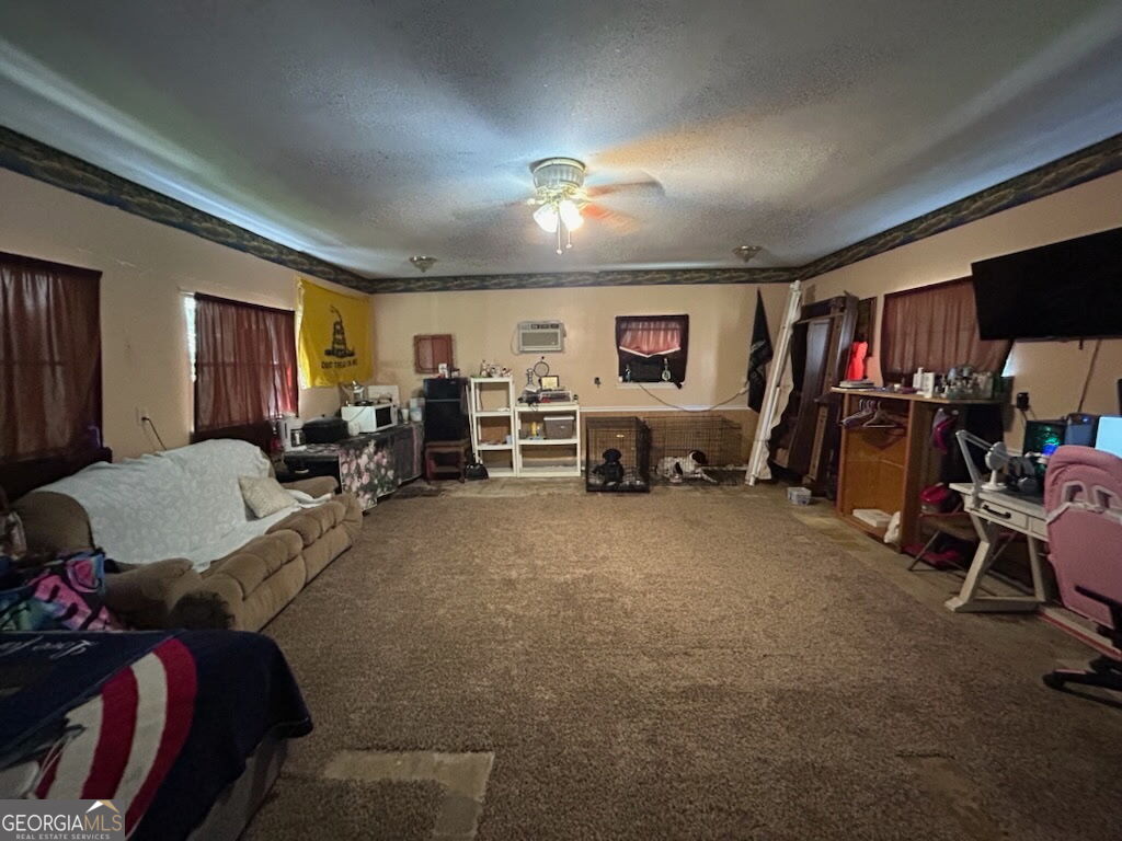 52 Brenda Road Twin City, GA 30471 - Photo 5 of 8 a view of a livingroom with furniture and windows