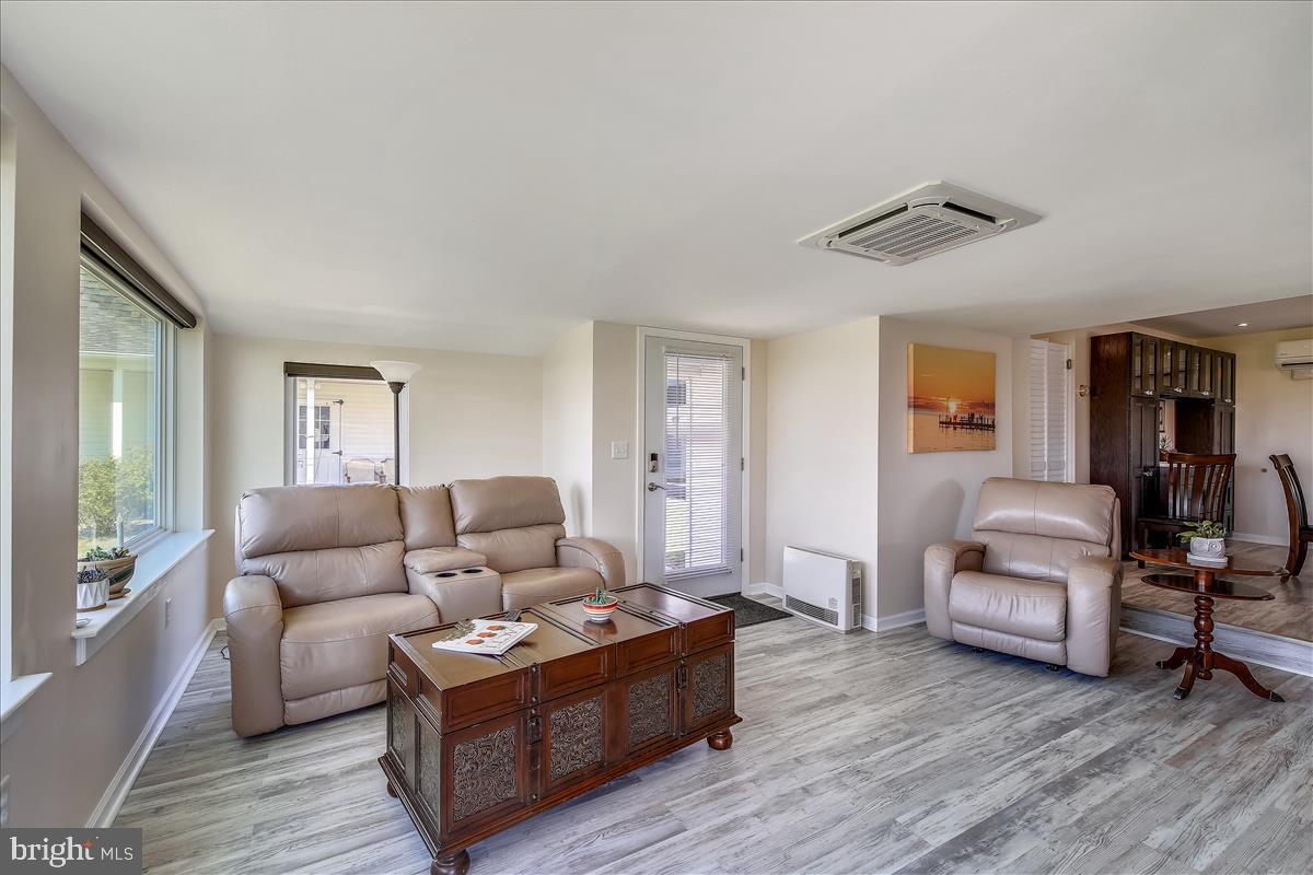 25764 Drum Point Road Westover, MD 21871 - Photo 15 of 29 Family Room to Side Door and Garage