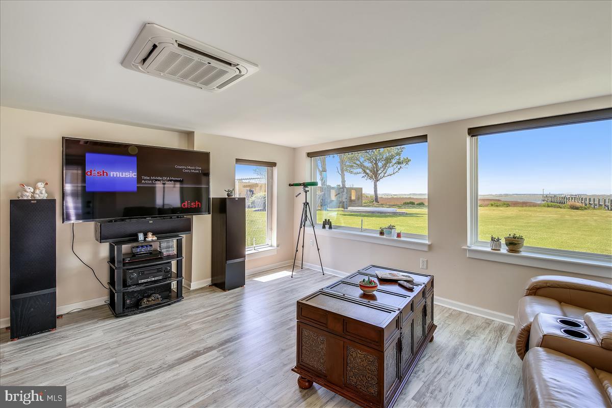 25764 Drum Point Road Westover, MD 21871 - Photo 16 of 29 Family Room Windows offer Waterfront Views