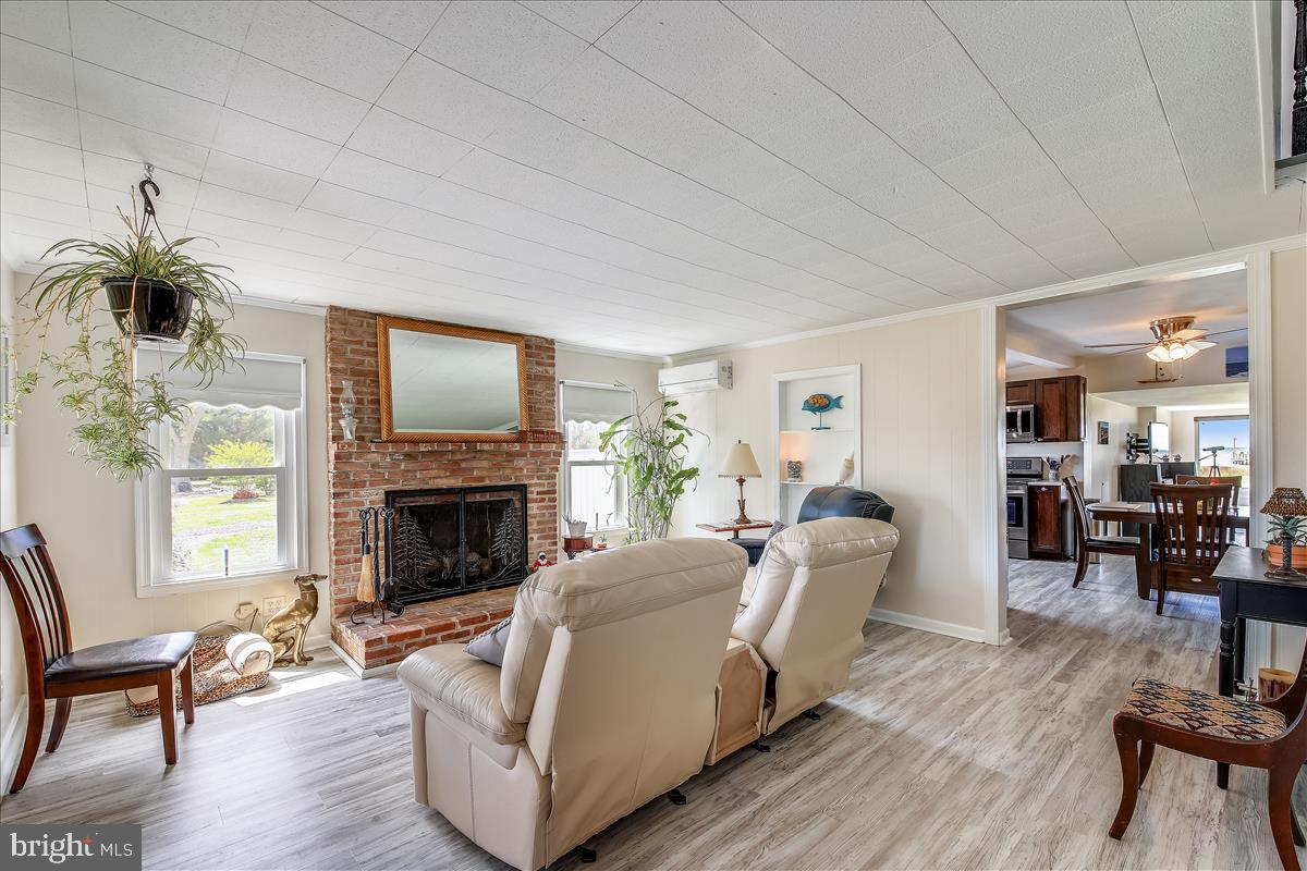 25764 Drum Point Road Westover, MD 21871 - Photo 9 of 29 15'x18' Living Room with Gas Fireplace