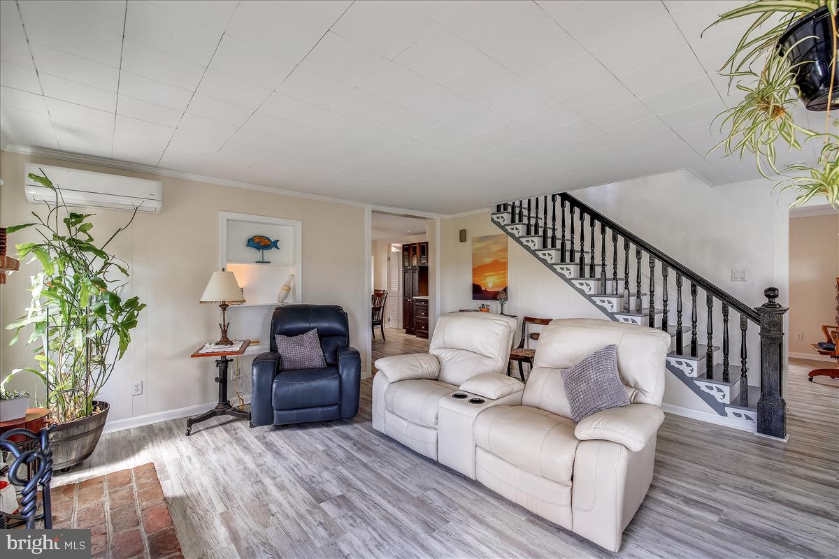 25764 Drum Point Road Westover, MD 21871 - Photo 10 of 29 Living Room Stairs to Upstairs Bedrooms and Bath