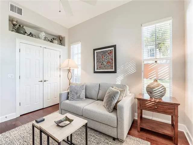 a view of an entryway with wooden floor