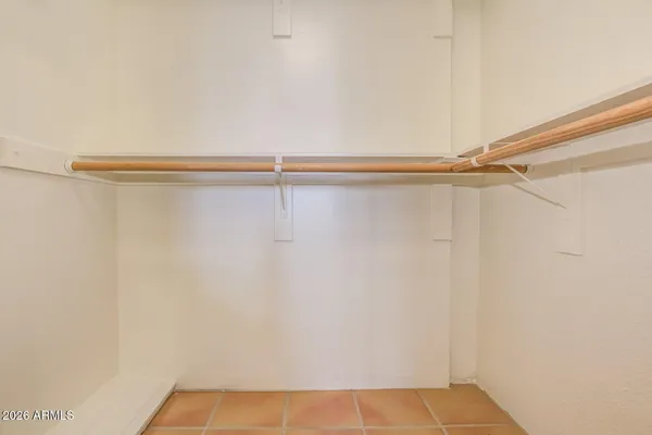 a view of a room with racks on the wall