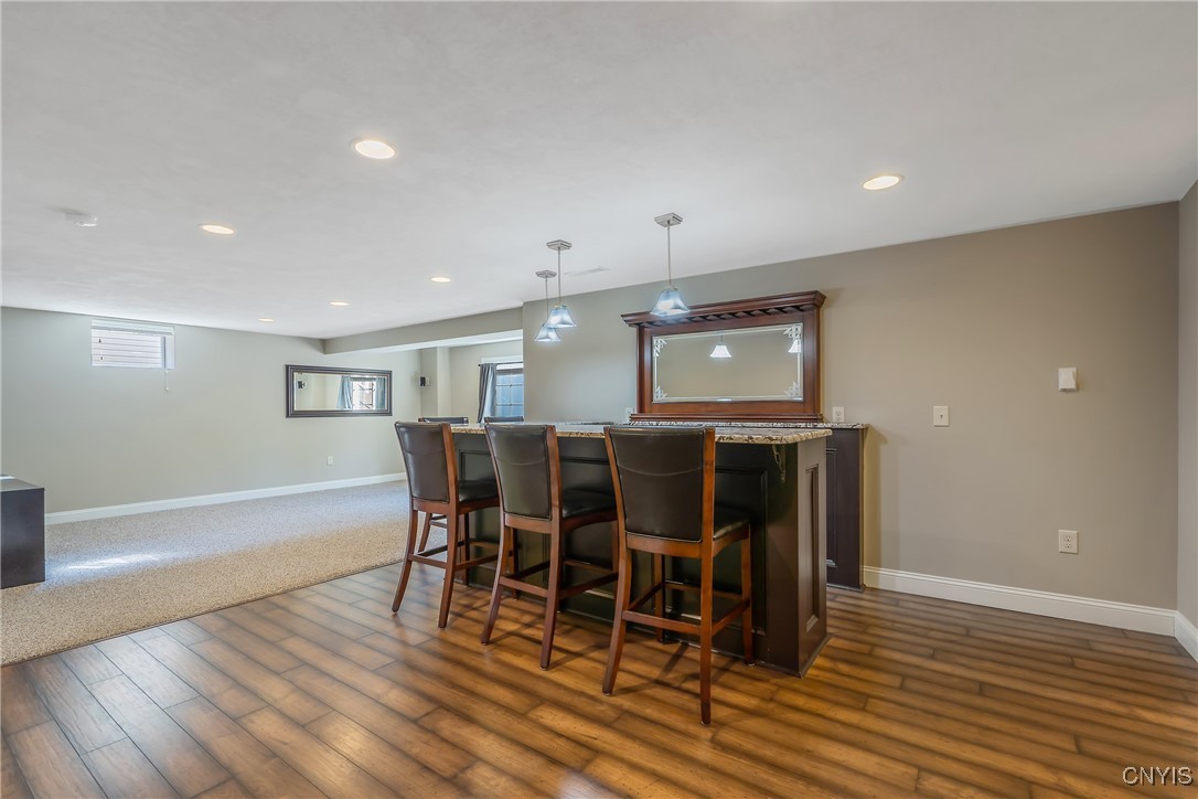 4972 Astilbe Path Clay, NY 13088 - Photo 35 of 46 Fantastic bar in the full, finished basement
