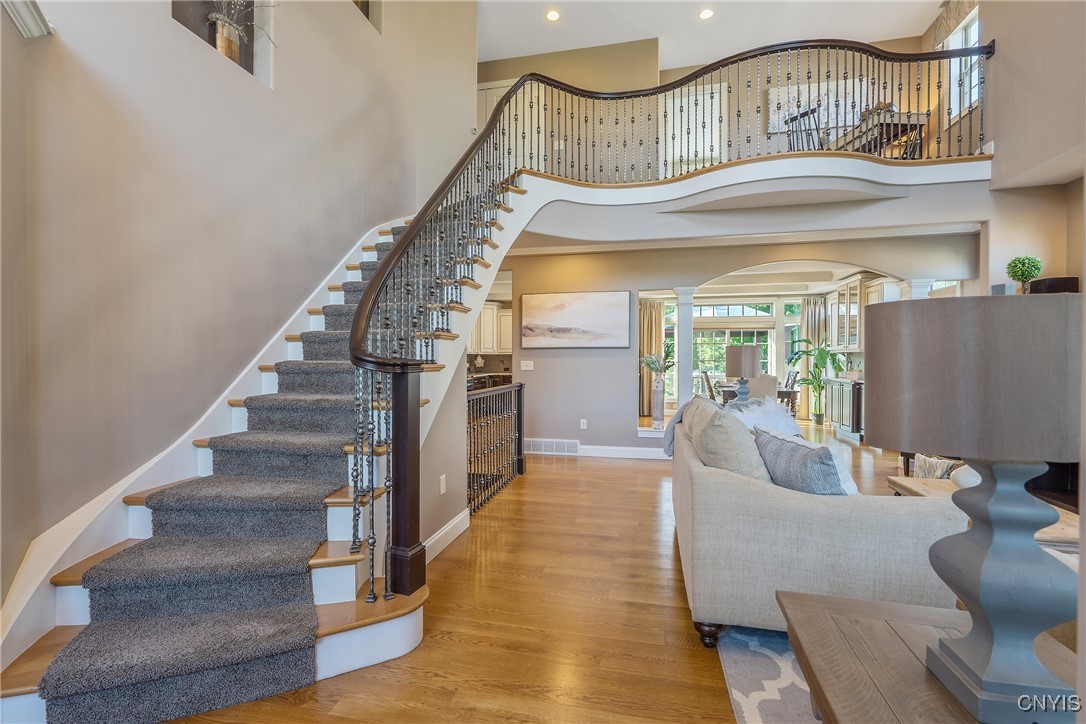 4972 Astilbe Path Clay, NY 13088 - Photo 7 of 46 Elegant curved staircase