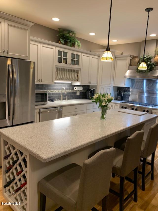 19 State Line Road West Stockbridge, MA 01266 - Photo 17 of 45 a kitchen with kitchen island a counter space a sink and appliances