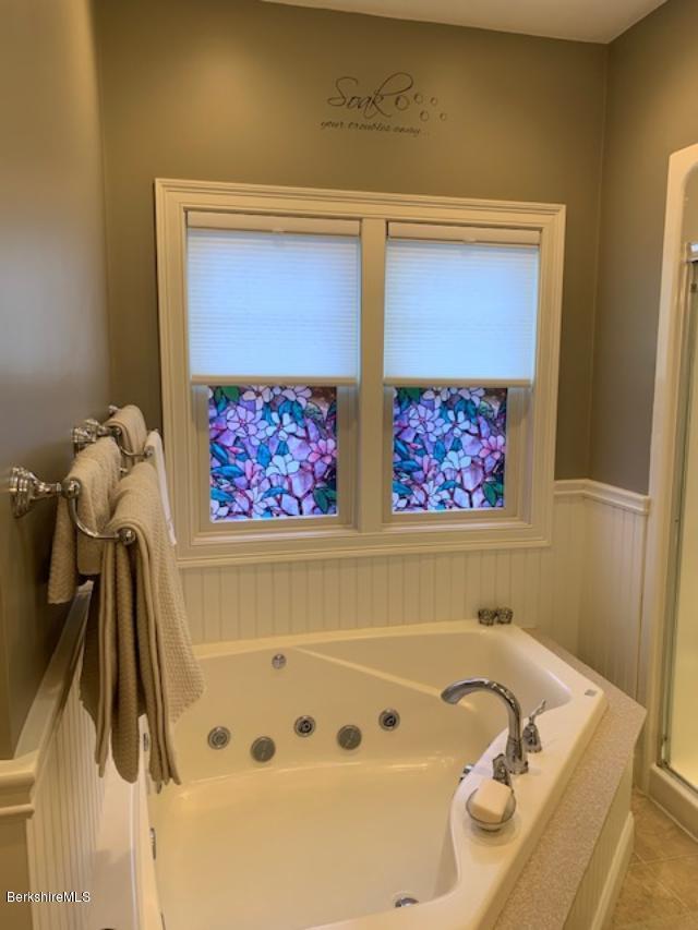 19 State Line Road West Stockbridge, MA 01266 - Photo 23 of 45 a bathroom with a tub and a shower