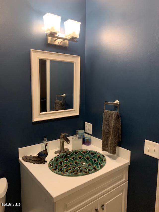 19 State Line Road West Stockbridge, MA 01266 - Photo 24 of 45 a bathroom with a sink vanity and a mirror