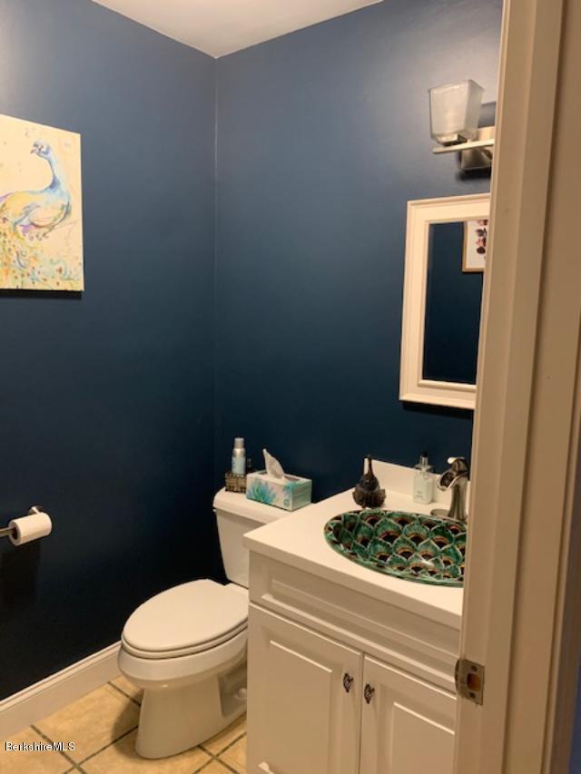 19 State Line Road West Stockbridge, MA 01266 - Photo 25 of 45 a bathroom with a sink toilet and mirror