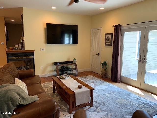19 State Line Road West Stockbridge, MA 01266 - Photo 26 of 45 a living room with furniture and a flat screen tv