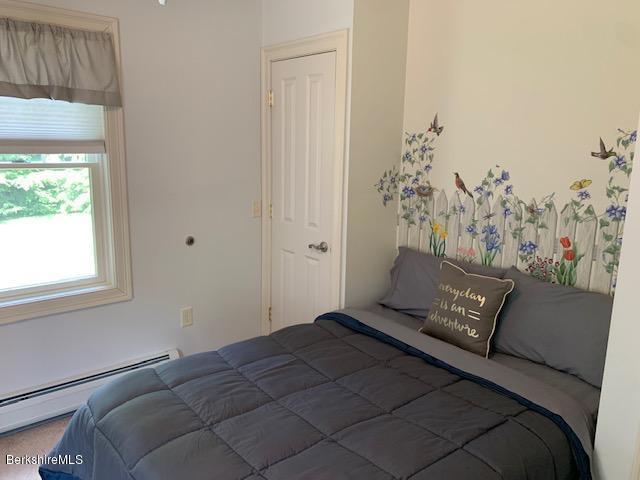 19 State Line Road West Stockbridge, MA 01266 - Photo 41 of 45 a bed sitting in a bedroom next to a window