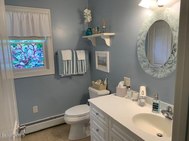 19 State Line Road West Stockbridge, MA 01266 - Photo 42 of 45 a bathroom with a sink mirror and toilet