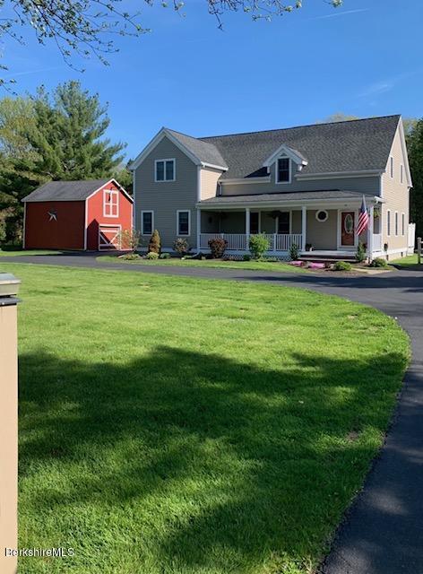 19 State Line Road West Stockbridge, MA 01266 - Photo 45 of 45 a front view of house with yard and outdoor seating