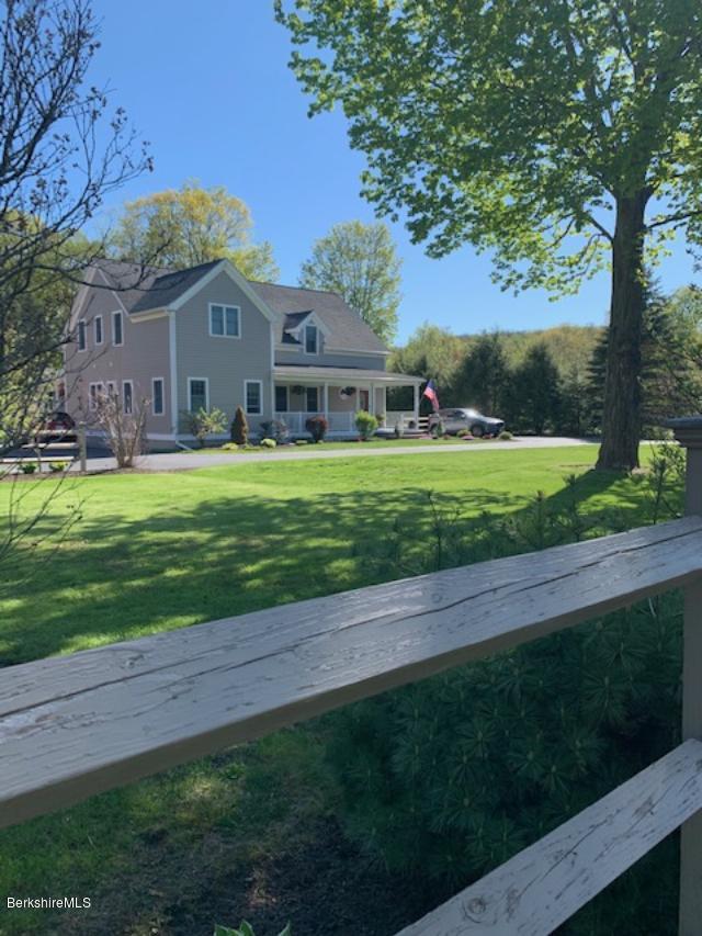 19 State Line Road West Stockbridge, MA 01266 - Photo 7 of 45 a front view of a house with a yard
