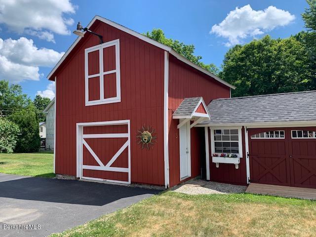 19 State Line Road West Stockbridge, MA 01266 - Photo 8 of 45 a front view of a house with garden