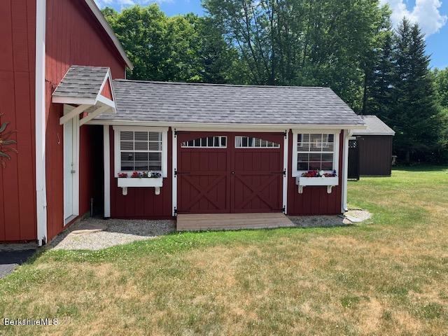 19 State Line Road West Stockbridge, MA 01266 - Photo 9 of 45 a view of a house with a yard and garage