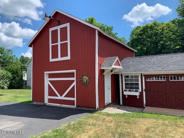 19 State Line Road West Stockbridge, MA 01266 - Photo 10 of 45 a front view of a house with garden