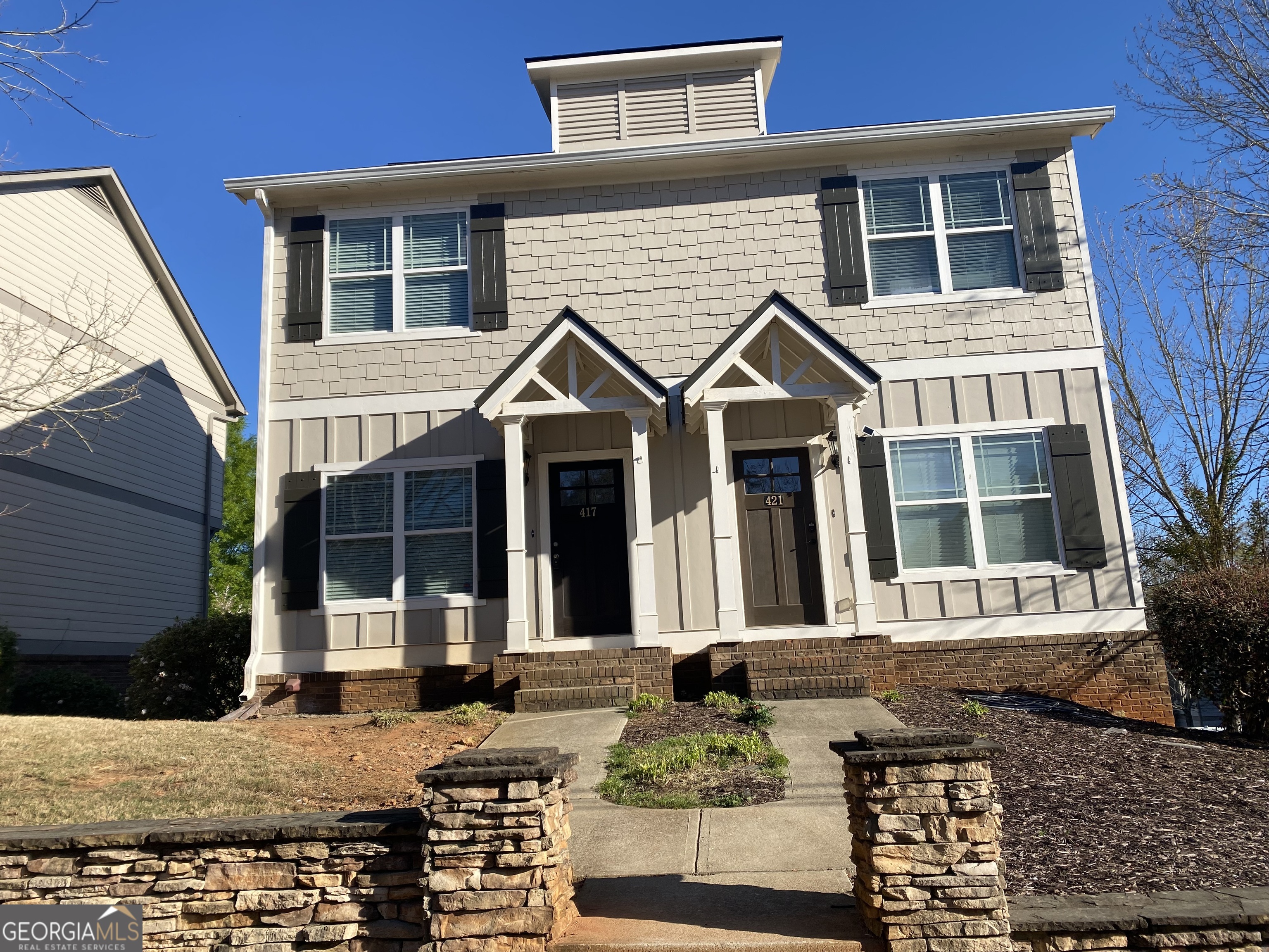 417 Whitehall Road Athens, GA 30605 - Photo 39 of 72 a front view of a house with windows