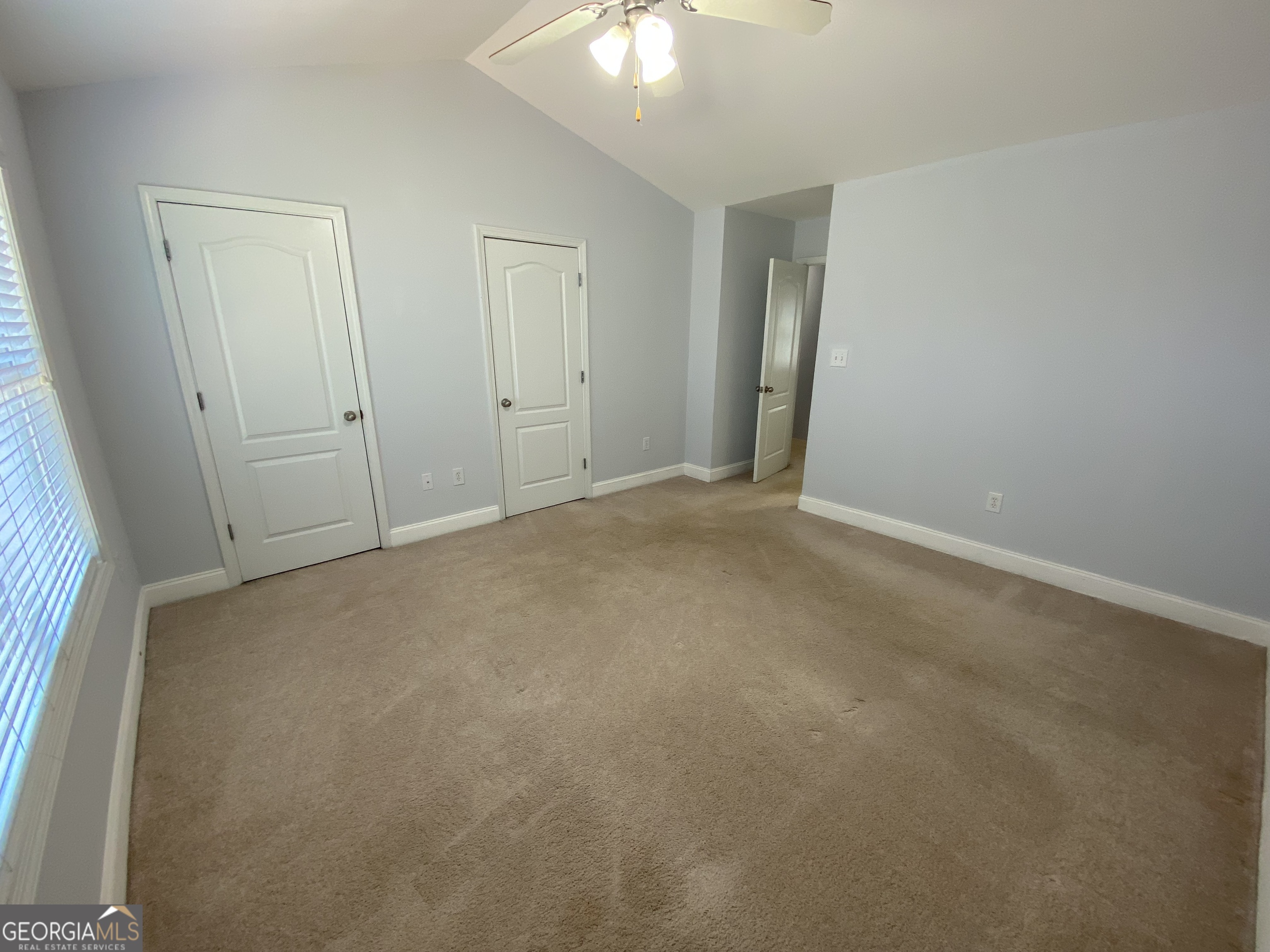 417 Whitehall Road Athens, GA 30605 - Photo 42 of 72 a view of an empty room and a chandelier fan
