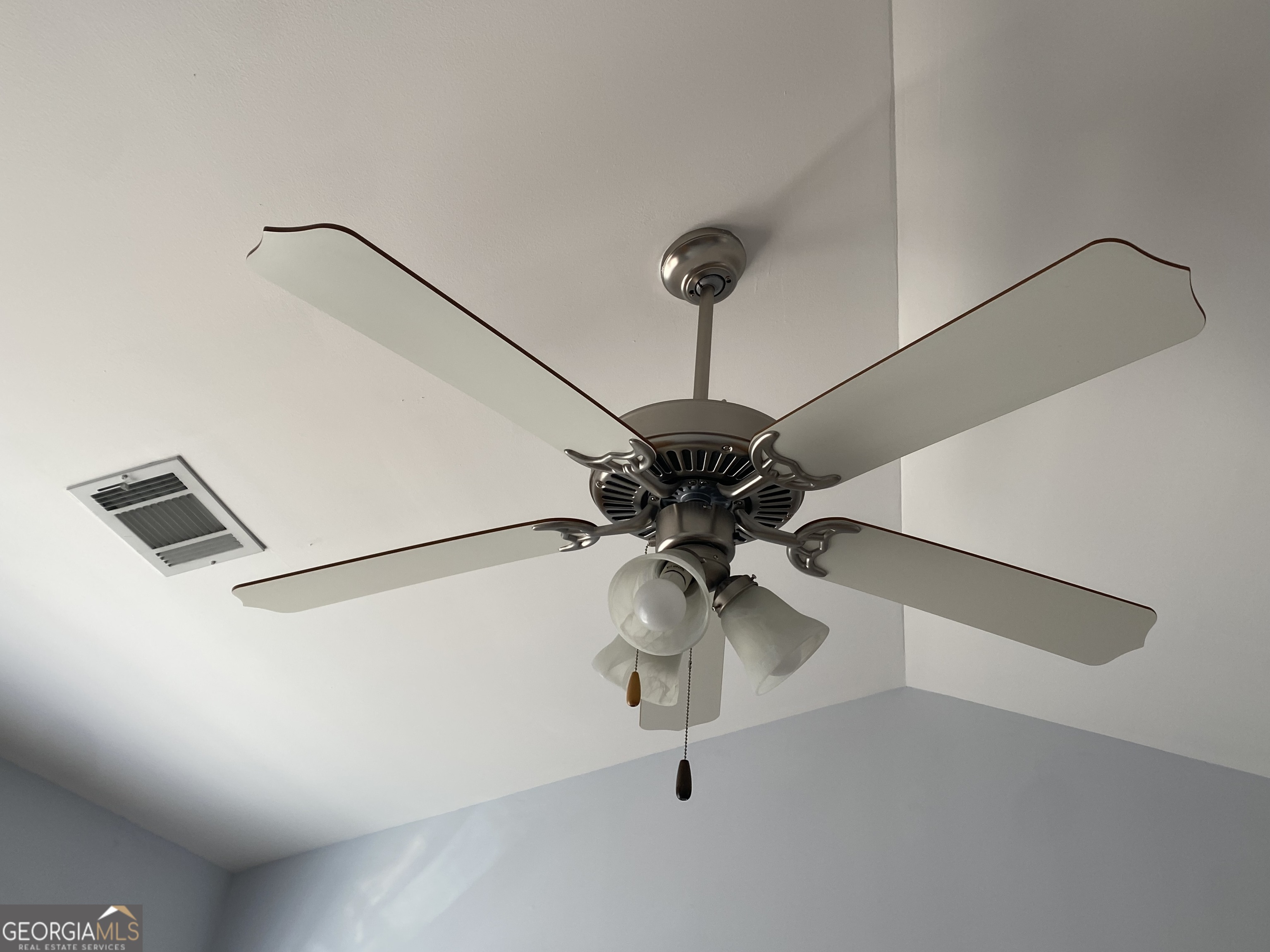 417 Whitehall Road Athens, GA 30605 - Photo 46 of 72 a view of a chandelier and a ceiling fan in a room