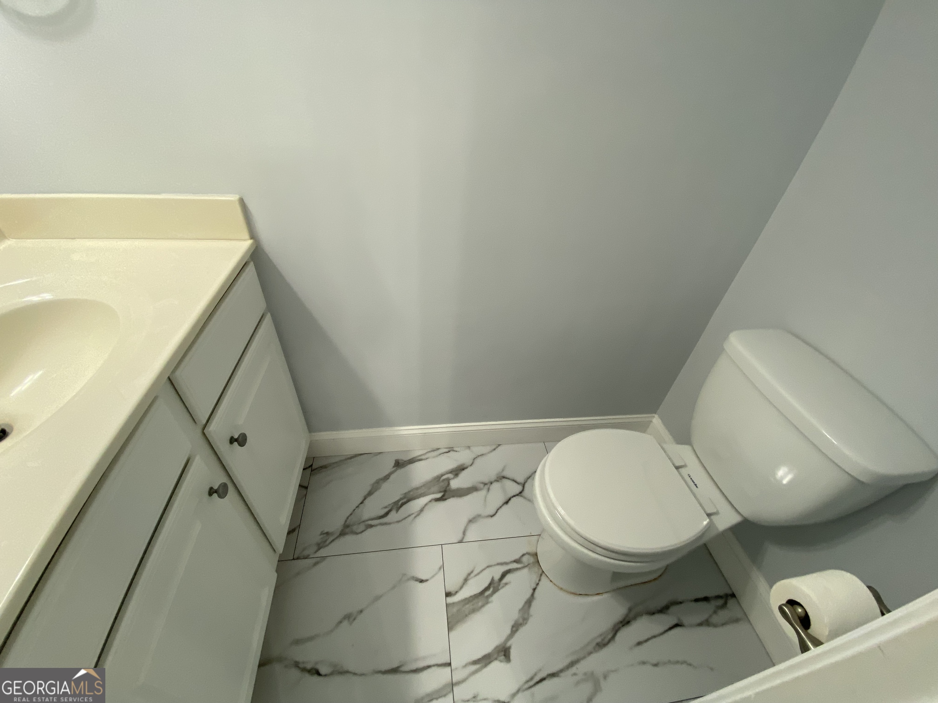 417 Whitehall Road Athens, GA 30605 - Photo 52 of 72 a bathroom with a toilet and a sink