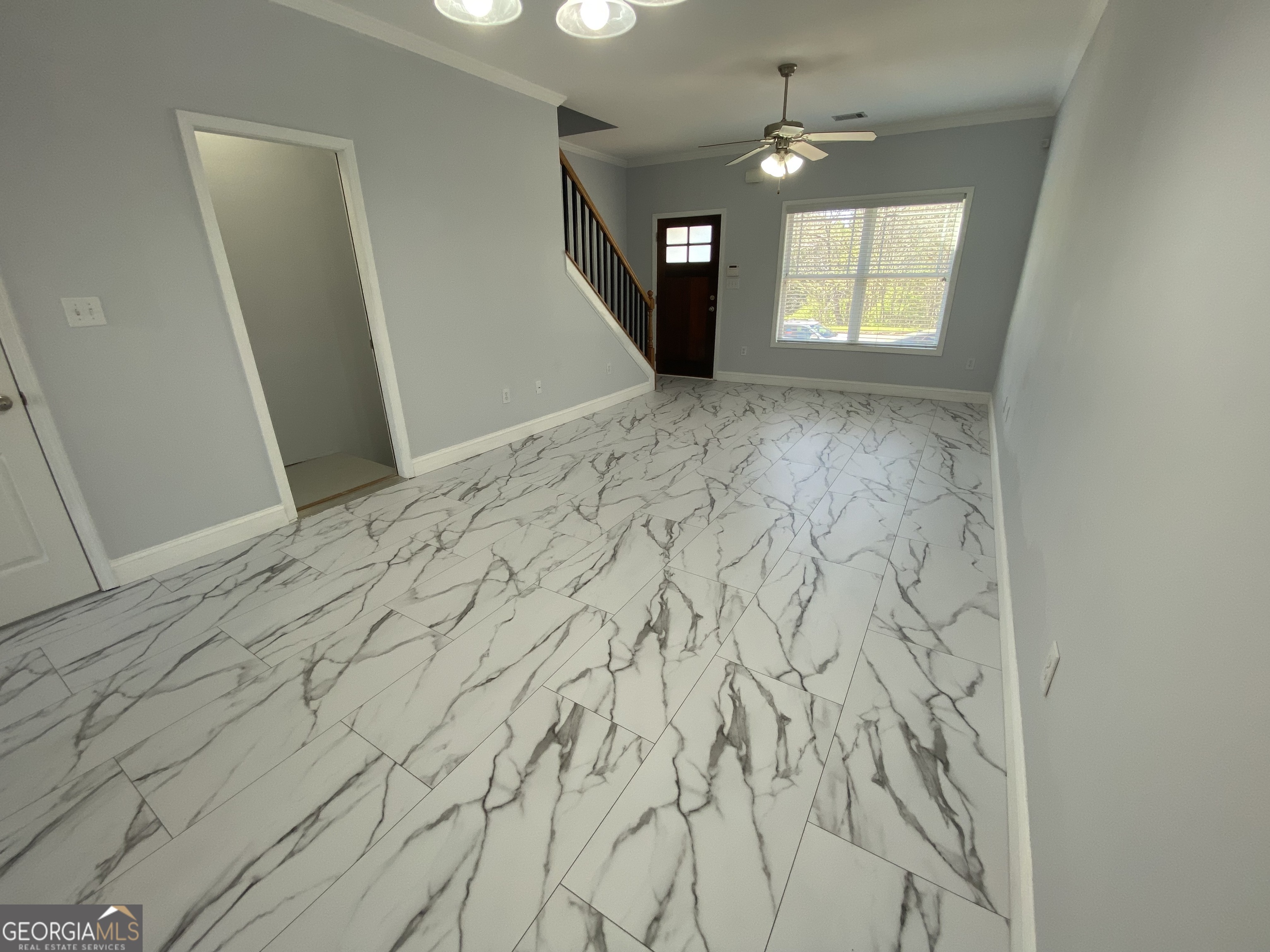 417 Whitehall Road Athens, GA 30605 - Photo 58 of 72 an empty room with windows and fireplace