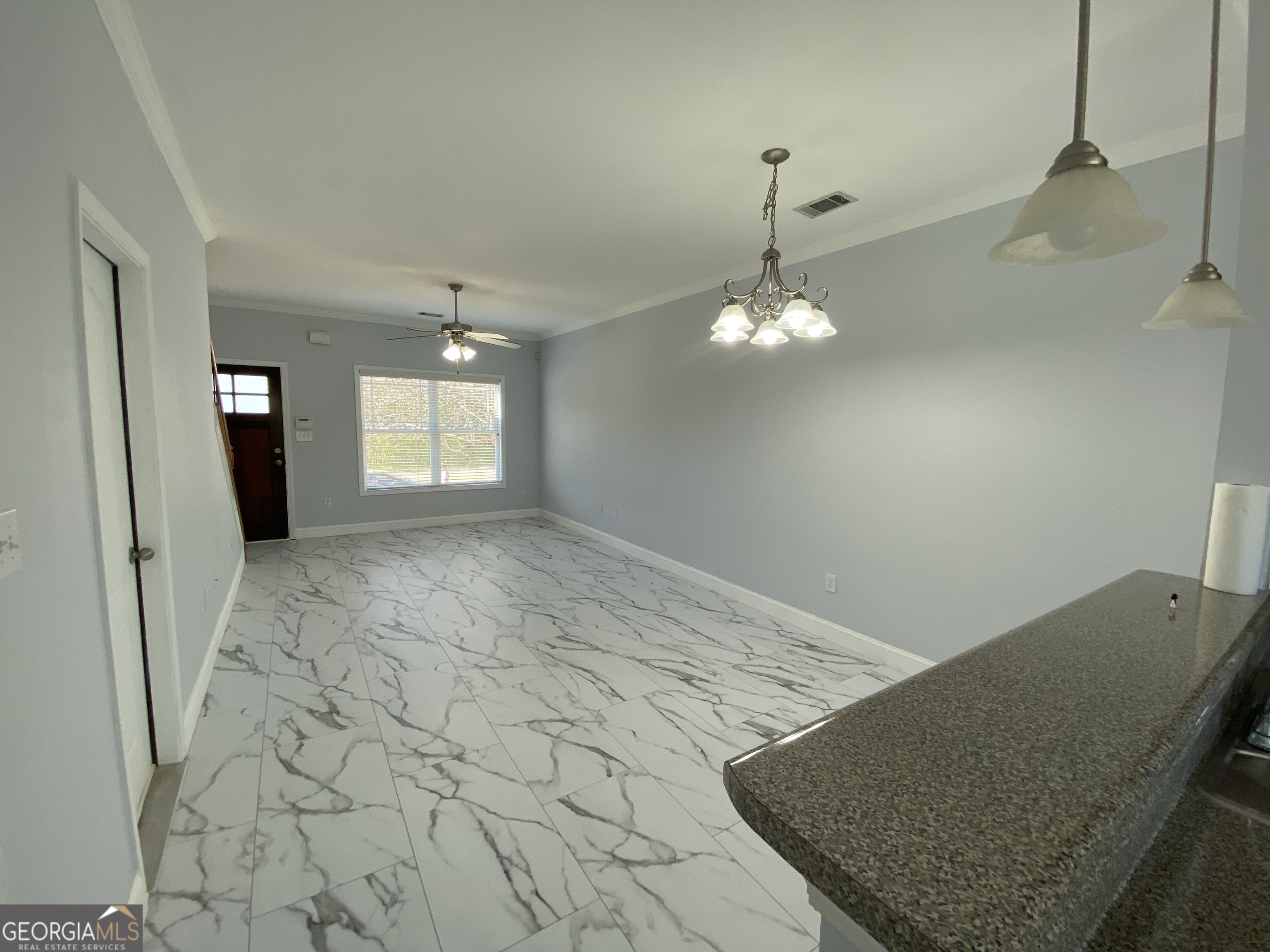 417 Whitehall Road Athens, GA 30605 - Photo 67 of 72 a view of a livingroom with a chandelier