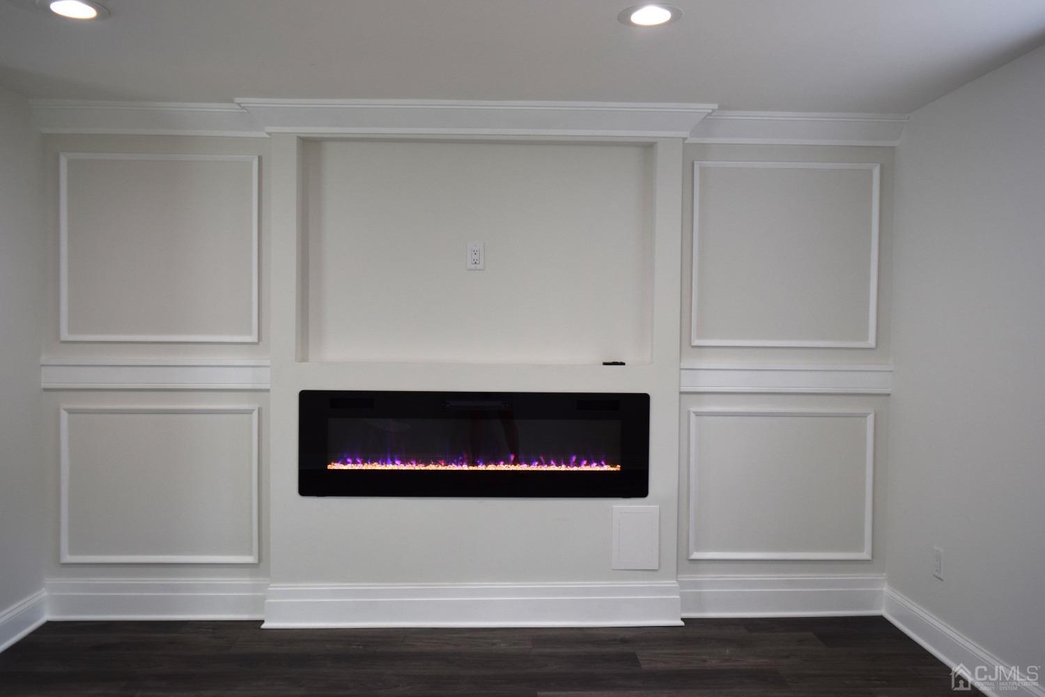 42 West Cliff Road Colonia, NJ 07067 - Photo 9 of 14 a room with a fireplace