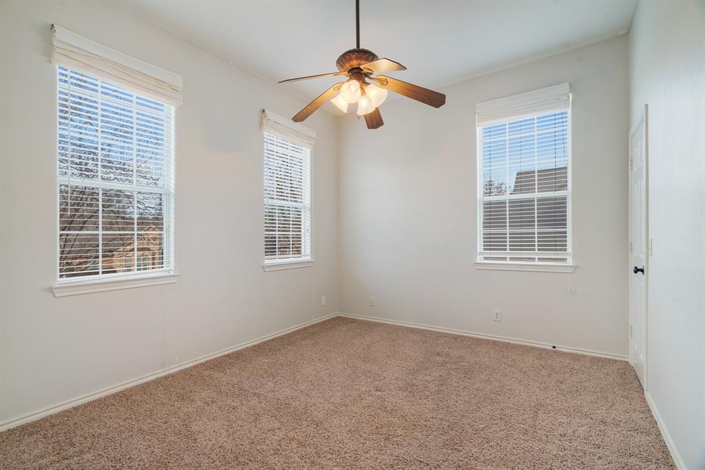 512 Brookes Way Reno, TX 75462 - Photo 21 of 27 a view of empty room with windows