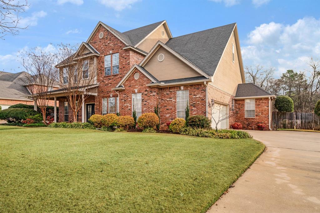 512 Brookes Way Reno, TX 75462 - Photo 3 of 27 a view of a big house with a big yard and potted plants